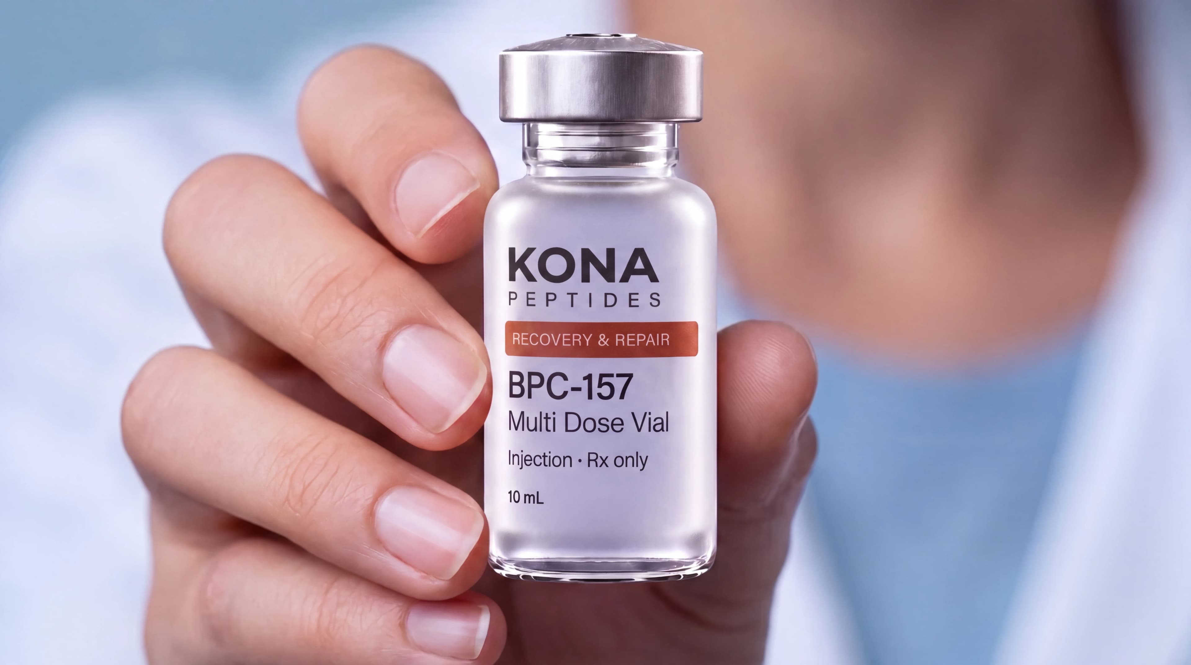 A hand holding a BPC-157 vial